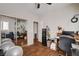 This home office has hardwood floors and shelving for storage at 2864 Cape Verde Ln, Las Vegas, NV 89128