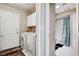 A practical laundry area, complete with a washing machine and dryer set at 2864 Cape Verde Ln, Las Vegas, NV 89128