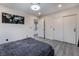 An inviting bedroom features a dark color scheme, and bright white trim and decorations at 1168 Spago Ln, Henderson, NV 89052