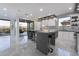 Stylish kitchen featuring a large island, modern cabinetry, and stainless steel appliances at 1168 Spago Ln, Henderson, NV 89052