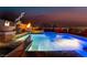 Backyard swimming pool featuring water features, outdoor lighting and lounge areas at 1168 Spago Ln, Henderson, NV 89052