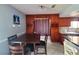 Dining area with stylish built in cabinets, seating for four, and natural light at 1208 Lucia Dr, Las Vegas, NV 89128