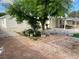 The backyard includes an array of trees and stone decor at 1320 Norman Ave, Las Vegas, NV 89104