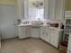 This kitchen is well lit, with plentiful counter and cabinet space at 1320 Norman Ave, Las Vegas, NV 89104