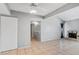 Cozy bedroom featuring neutral walls, tile flooring, ample closet space, and plenty of natural light at 1701 E Katie Ave # 36, Las Vegas, NV 89119