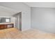 Empty bedroom with tile flooring, neutral walls and doorway to the ensuite bathroom at 1701 E Katie Ave # 36, Las Vegas, NV 89119