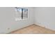 Bare bedroom features tile flooring, natural light from window at 1701 E Katie Ave # 36, Las Vegas, NV 89119