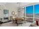 Dining area with city view featuring modern chandelier fixture and access to the main bedroom at 2000 Fashion Show Dr # 6109, Las Vegas, NV 89109