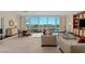 Spacious living room with plenty of natural light, comfortable seating and amazing views of the Las Vegas strip at 2000 Fashion Show Dr # 6109, Las Vegas, NV 89109