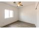 A standard bedroom with wood-look floors, closet and window at 2128 La Salle St, Las Vegas, NV 89106