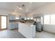 Kitchen with stainless steel appliances, light blue cabinets, breakfast bar, and mosaic backsplash at 2128 La Salle St, Las Vegas, NV 89106