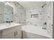 Bathroom showcases modern tiling and fixtures, including a tub and marble-tiled shower at 2200 S Fort Apache Rd # 2153, Las Vegas, NV 89117