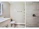 This bathroom features a modern vanity, toilet, and a beautifully tiled walk-in shower at 2200 S Fort Apache Rd # 2153, Las Vegas, NV 89117