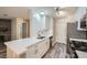 Modern kitchen features white cabinets, stainless steel appliances, and new hard surface countertops at 2200 S Fort Apache Rd # 2153, Las Vegas, NV 89117