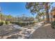 Condo community featuring tennis courts, mature trees and meticulously manicured landscaping at 2200 S Fort Apache Rd # 2153, Las Vegas, NV 89117