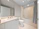 This bathroom has a tub/shower and a white vanity with a framed mirror at 222 Karen Ave # 1908, Las Vegas, NV 89109