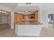 Modern kitchen with stainless steel appliances, granite countertops, and a breakfast bar for casual dining at 222 Karen Ave # 1908, Las Vegas, NV 89109
