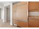 This kitchen has built-in refrigerator, granite counters and tile floor at 222 Karen Ave # 1908, Las Vegas, NV 89109