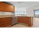 Kitchen with granite counters, stainless appliances, tile floor and great city views at 222 Karen Ave # 1908, Las Vegas, NV 89109