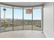 Living area featuring floor-to-ceiling windows offering stunning views of the city skyline at 222 Karen Ave # 1908, Las Vegas, NV 89109