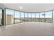 Open living area featuring tile floors and a wall of windows with city views at 222 Karen Ave # 1908, Las Vegas, NV 89109