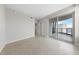 Spacious room featuring a large window to the balcony, and neutral tile flooring at 222 Karen Ave # 1908, Las Vegas, NV 89109