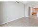 Open floor plan showcasing the bright kitchen and living room with tile floors at 222 Karen Ave # 1908, Las Vegas, NV 89109