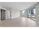 Inviting living room with large windows, tile floors, and access to a private balcony with stunning city views at 222 Karen Ave # 1908, Las Vegas, NV 89109