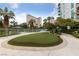 Putting green with palm trees and well maintained landscaping at 222 Karen Ave # 1908, Las Vegas, NV 89109