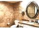 Bathroom featuring granite counters, vanity with storage, designer faucet and framed oval mirror at 30 Strada Di Villaggio # 118, Henderson, NV 89011