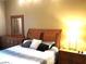 Bedroom featuring a dresser, nightstands and decorative pillows at 30 Strada Di Villaggio # 118, Henderson, NV 89011