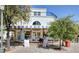 Retail space for lease with awnings and landscaping near the entrance at 30 Strada Di Villaggio # 118, Henderson, NV 89011