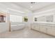 Luxurious bathroom with soaking tub, dual sink vanity, natural light, and modern fixtures at 3021 Ocean Port Dr, Las Vegas, NV 89117
