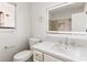 Modern bathroom featuring white marble countertop, neutral color palette, and great natural light at 3021 Ocean Port Dr, Las Vegas, NV 89117