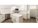 Spacious kitchen featuring a center island, stainless steel appliances, and a walk-in pantry at 3021 Ocean Port Dr, Las Vegas, NV 89117