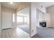 Bright living area with fireplace and neutral carpet at 3125 Cristobal Way, Las Vegas, NV 89117