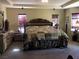 Spacious main bedroom featuring a decorative bed, neutral carpet, and plenty of natural light at 3601 Pinnate Dr, Las Vegas, NV 89147