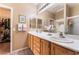 Bathroom with and sinks and a walk in closet at 3603 Herring Gull Ln, North Las Vegas, NV 89084