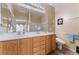 Bathroom with and sinks and a large mirror at 3603 Herring Gull Ln, North Las Vegas, NV 89084