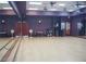 Large dance studio featuring hardwood floor, mirrors, wall-mounted fans, and sound system at 3603 Herring Gull Ln, North Las Vegas, NV 89084