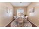 Cozy dining room with a glass table and plenty of natural light at 3603 Herring Gull Ln, North Las Vegas, NV 89084