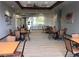 View of dining room with tables and chairs and view to exterior at 3603 Herring Gull Ln, North Las Vegas, NV 89084