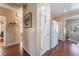Hallway with access to various rooms and views of the kitchen at 3603 Herring Gull Ln, North Las Vegas, NV 89084