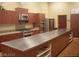 Spacious kitchen with stainless steel appliances and expansive countertops for cooking and entertaining at 3603 Herring Gull Ln, North Las Vegas, NV 89084