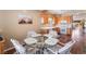 Eat in kitchen with a glass table and views of the oven and cabinets at 3603 Herring Gull Ln, North Las Vegas, NV 89084