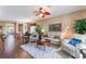 Comfortable living room with hardwood floors and a ceiling fan at 3603 Herring Gull Ln, North Las Vegas, NV 89084