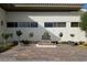 Peaceful memorial garden featuring stone benches, monument, lush landscaping, and commemorative features at 3603 Herring Gull Ln, North Las Vegas, NV 89084