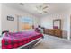 Spacious bedroom with a large window overlooking the landscape at 3608 Herring Gull Ln, North Las Vegas, NV 89084