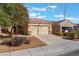 Inviting single-Gathering home with a two-car garage and low-maintenance desert landscaping at 3608 Herring Gull Ln, North Las Vegas, NV 89084