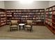 Cozy library featuring walls lined with bookshelves and comfortable seating area at 3608 Herring Gull Ln, North Las Vegas, NV 89084